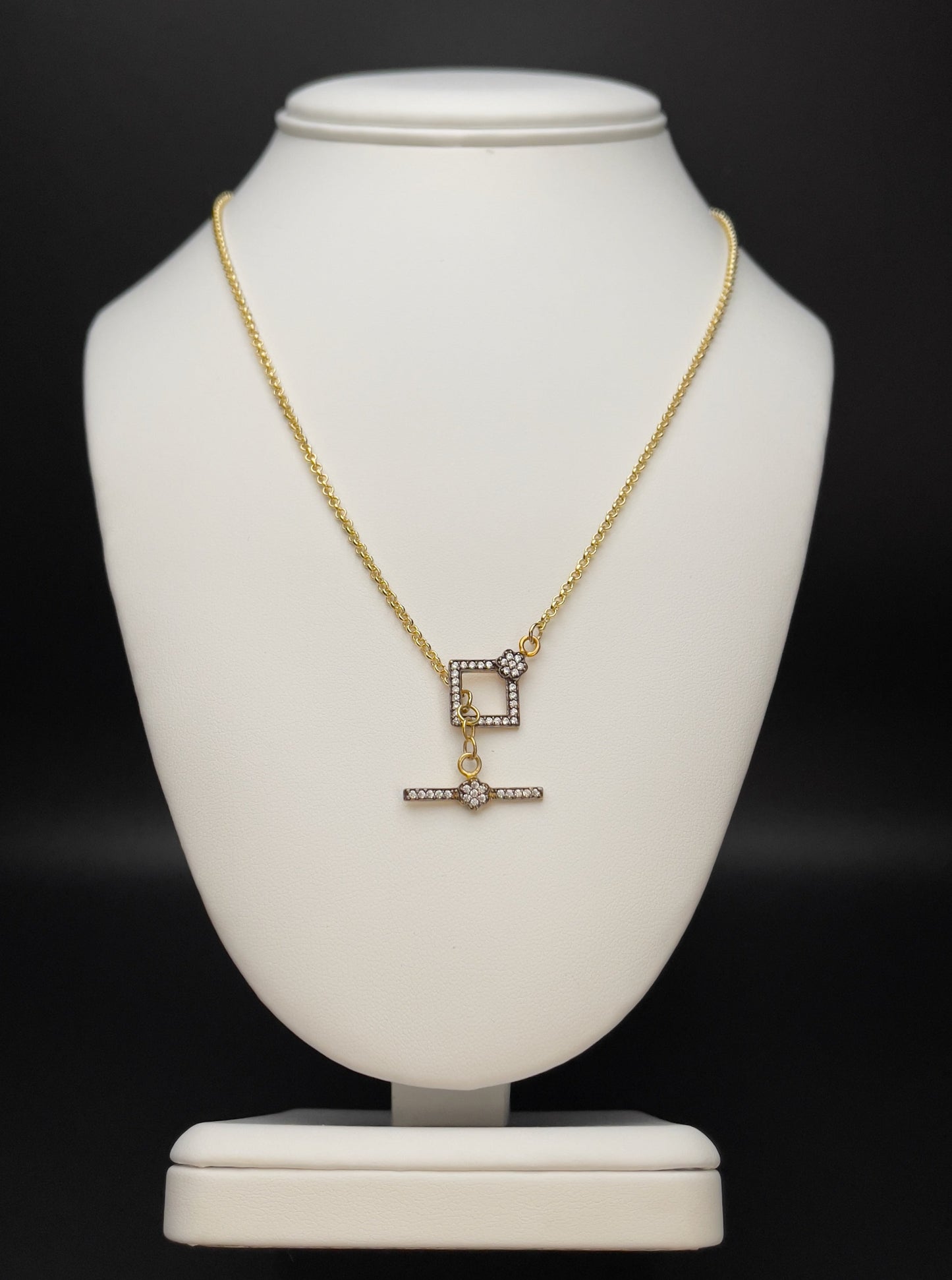 Image of necklace. Chain Length: 18 inches Chain Type: Round rolo Chain Thickness: 2 mm Toggle: 20 mm X 15 mm Chain: 24k Gold-filled Toggle: Gold vermeil with CZ pave