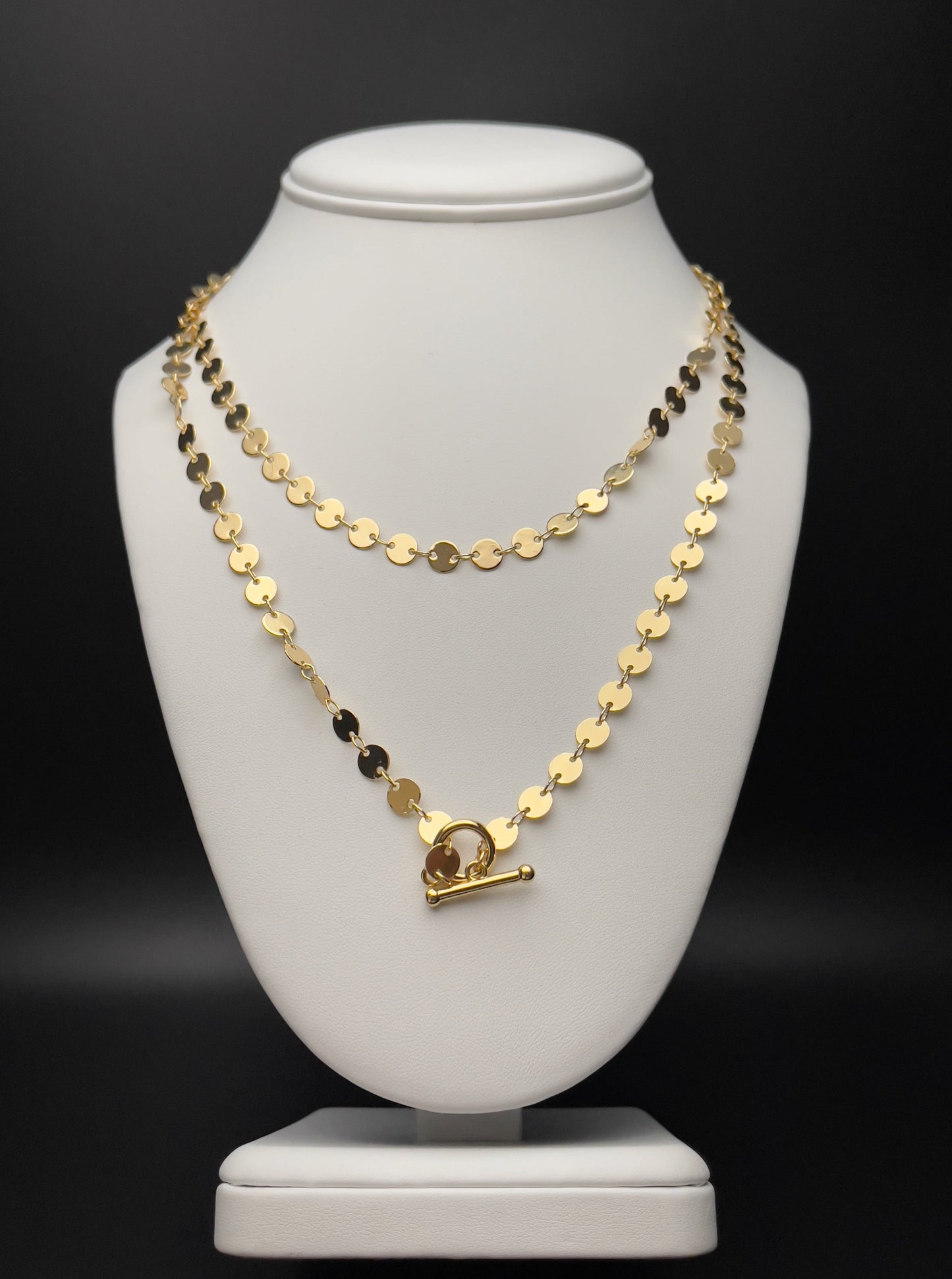 Image of necklace. Chain Length: 36 inches Chain Type: Polished disc Chain Thickness: 6 mm Clasp: Toggle Chain: 14k Gold-plated