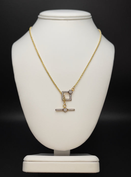 Image of necklace.  Chain Length: 18 inches Chain Type: Round rolo Chain Thickness: 2 mm Toggle: 20 mm X 15 mm  Chain: 24k Gold-filled Toggle: Gold vermeil with CZ pave