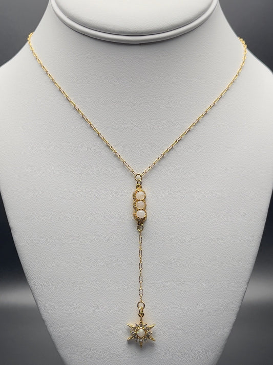 Image of necklace.  Chain Length: 16 inches with 2 inch extender Chain Type: Krinkle Chain Thickness: 1.7 mm Clasp: Lobster Charm: 20 mm X 7 mm Charm: 20 mm X 15 mm Chain:12k Gold-filled Charm: Gold-plated, moonstone, and micro-pave CZ Charm: 14k Gold-filled, opal, and micro-pave CZ