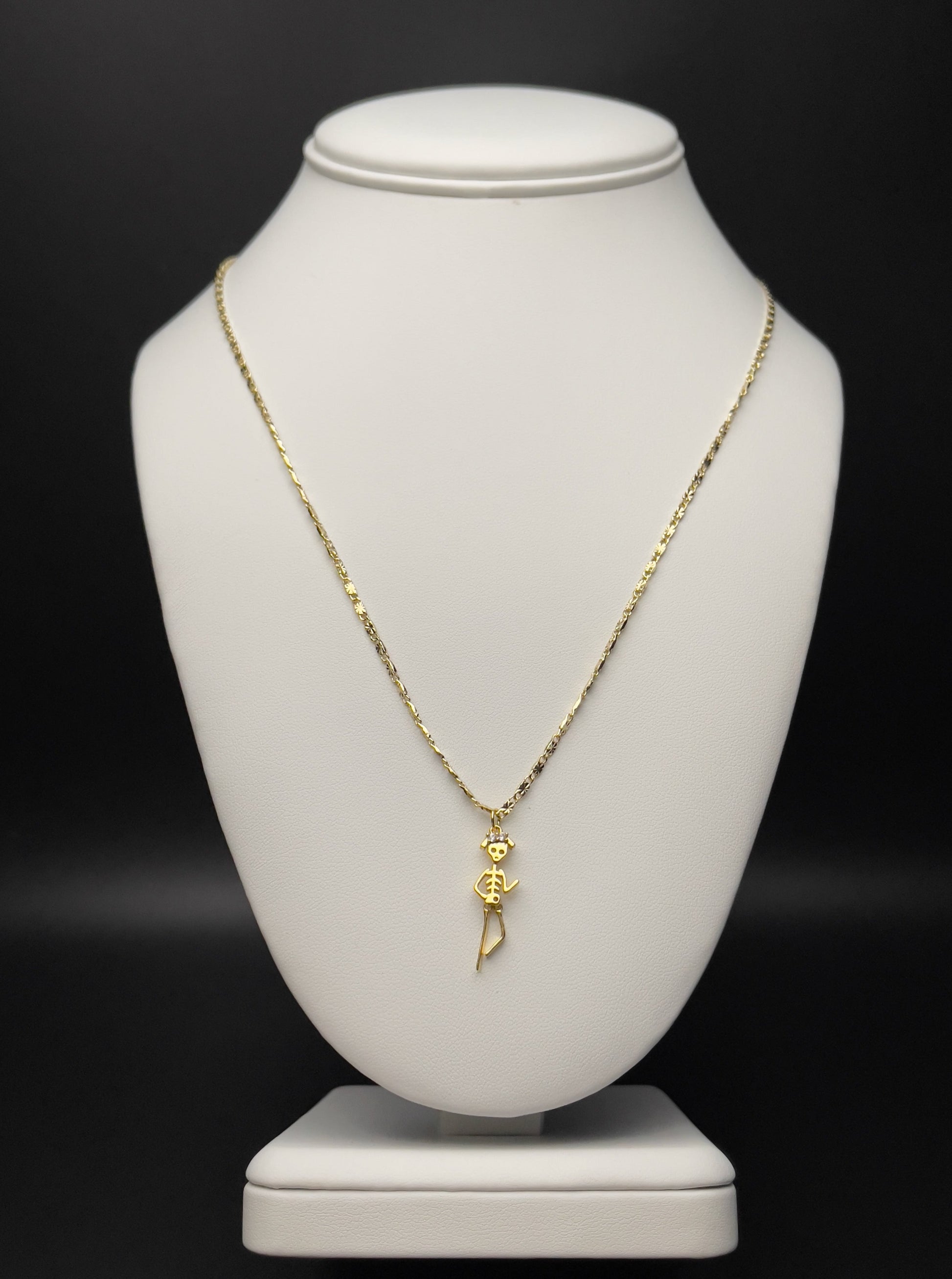 Image of necklace.  Chain Length: 19 inches Chain Type: Sunburst Chain Thickness: 1.6 mm Clasp: Lobster Charm: 8 X 25 mm  Chain: 14k Gold-filled Charm: 24k Gold-filled 