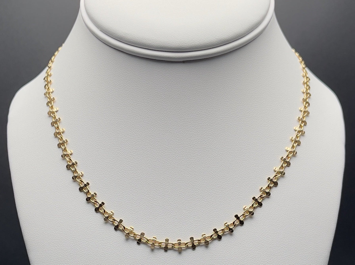 Close up image of gold-filled chain necklace 